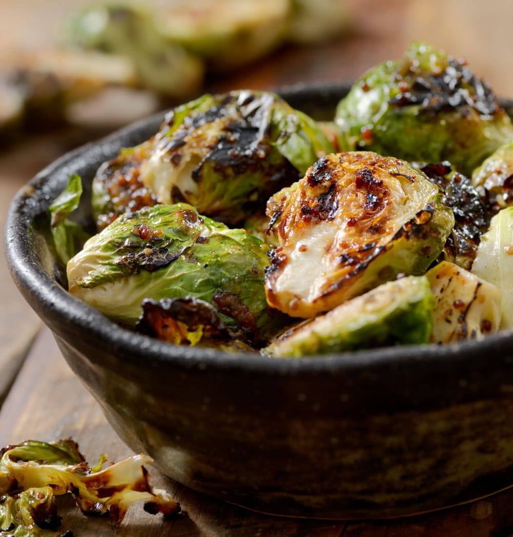 Crispy, baked, seasoned Brussel sprouts with tangy balsamic glaze
