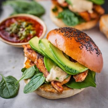 Cajun spiced chicken burgers with bacon, cheese and avocado